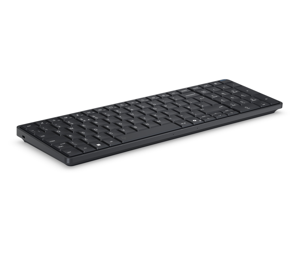 The HP EliteBoard G1a shown on its own - a full Windows 11 Pro AI PC built into a slim keyboard roughly 12mm thin and weighing about 750 grams.
